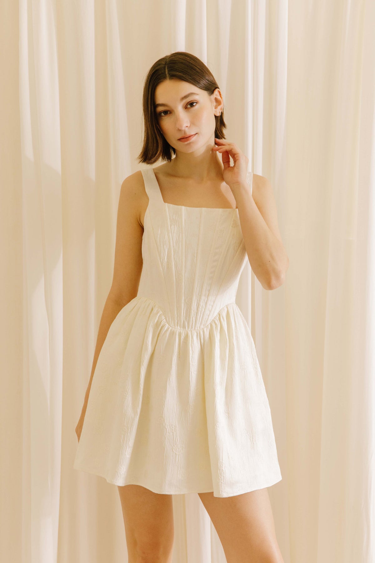 Monochromatic Embossed Daisy And Crepe Mini Dress Penelope The Label Monochromatic Embossed Daisy And Crepe Mini Dress Penelope The Label
